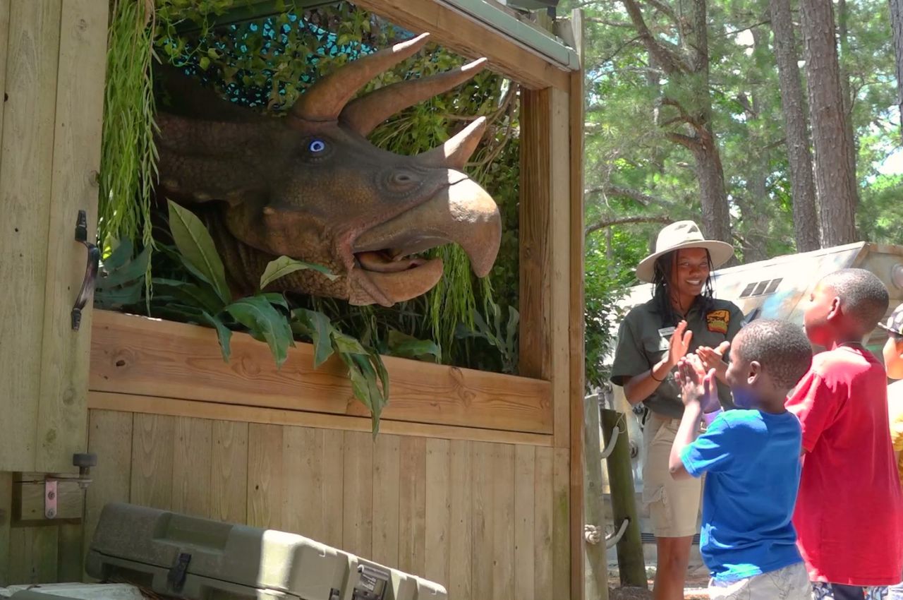 Animatronic dinosaur at Stone Mountain Park delights children